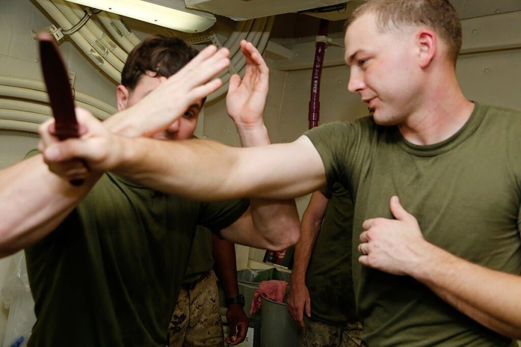 knife fighting practice with a dummy knife